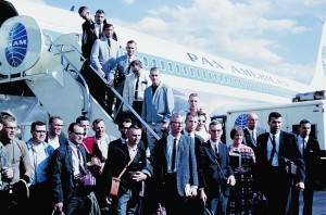 Iowa State University students board a plane in 1964 for a month-long trip to Europe as part of the Ag Travel Course.
