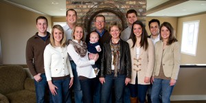 The Christensen family gathers for a family picture in their home