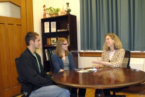 CALS students Andrew Owen (sophomore) and Gail Barnum (junior) visit with Dean Wintersteen at a round table