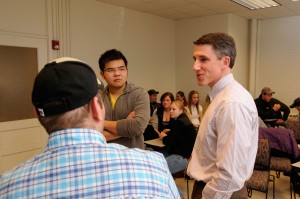 Kevin Kimle speaks to students in a classroom about entrepreneurship