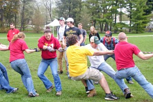 Forestry club students participate in a tug-of-war in the lush green grass on central campus.