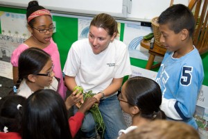 An Iowa State graduate visits an elementary classroom in San Diego to teach them about agriculture