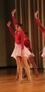 McKaila von Rentzell performs on stage with one of Iowa State's dance clubs.