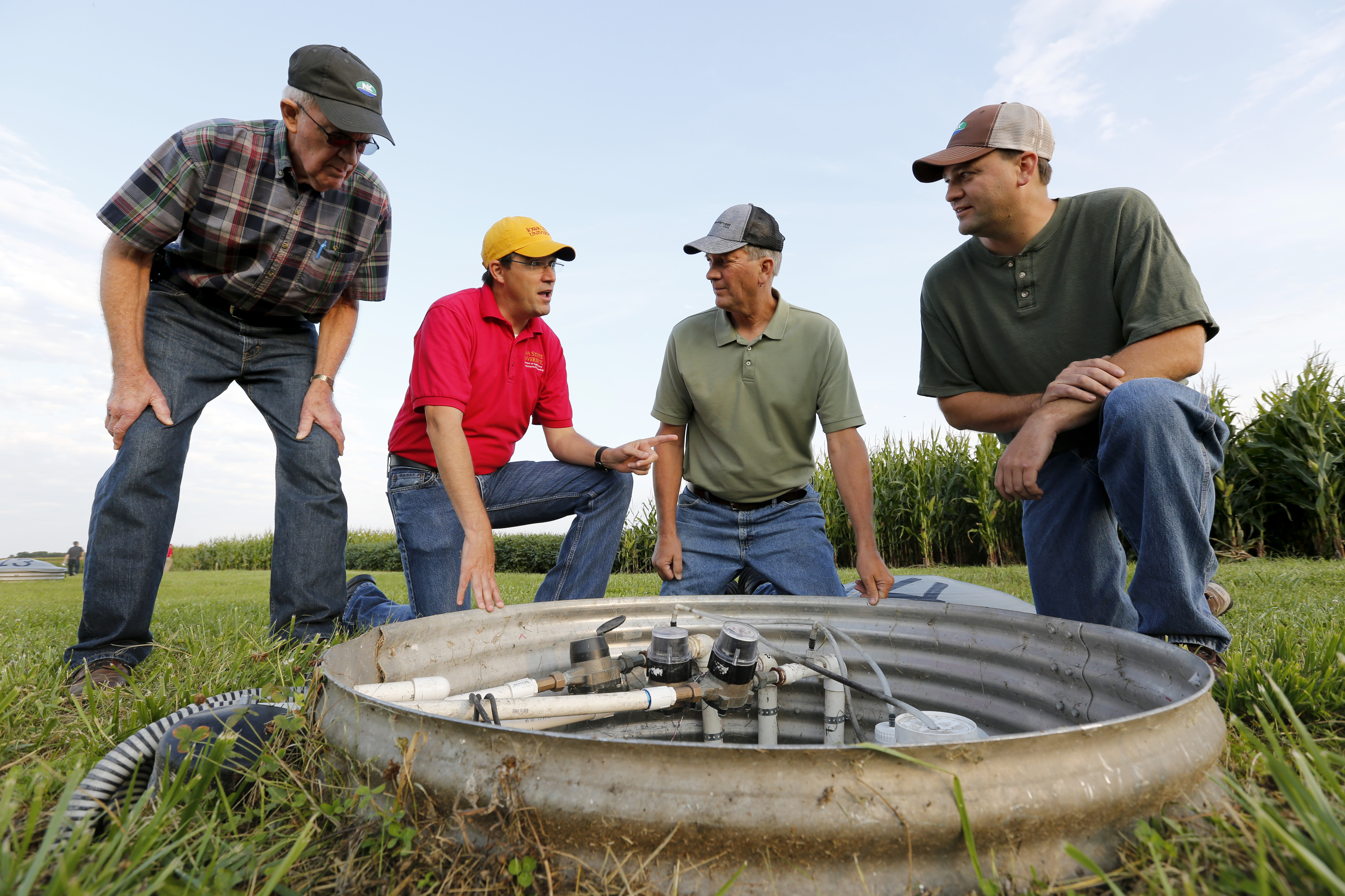 Farmers gather around a site at Nutrient Reduction Strategies Field Day
