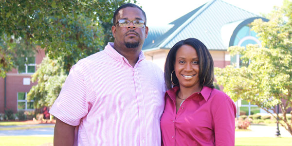 Alabama A&M University faculty and CALS grads Armitra Jackson-Davis and Dedrick Davis pose on the A&M campus.