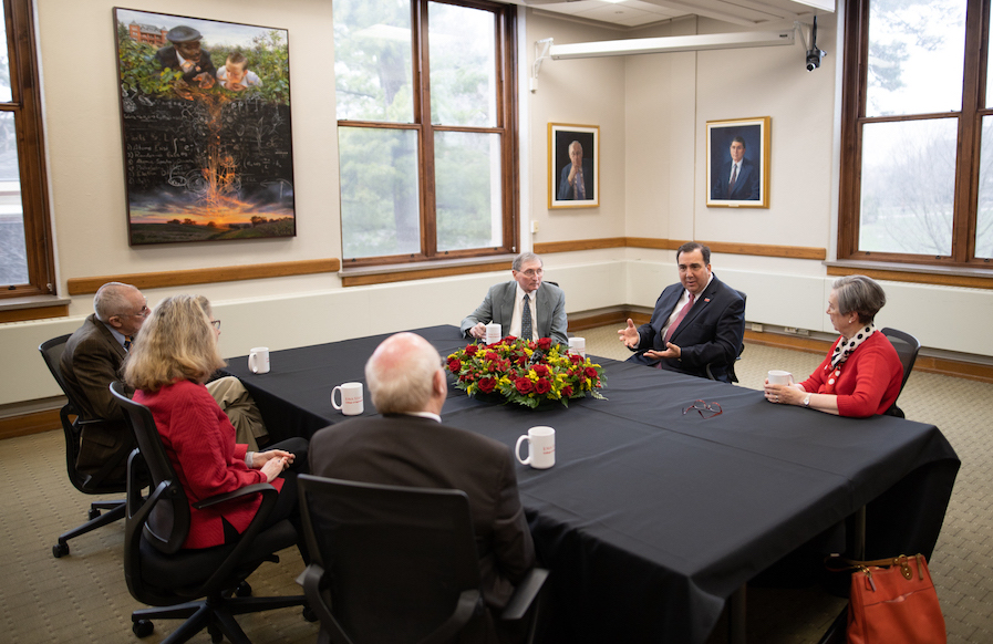 former deans of CALS have a discussion in the dean's conference room