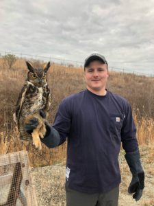 Man holding owl